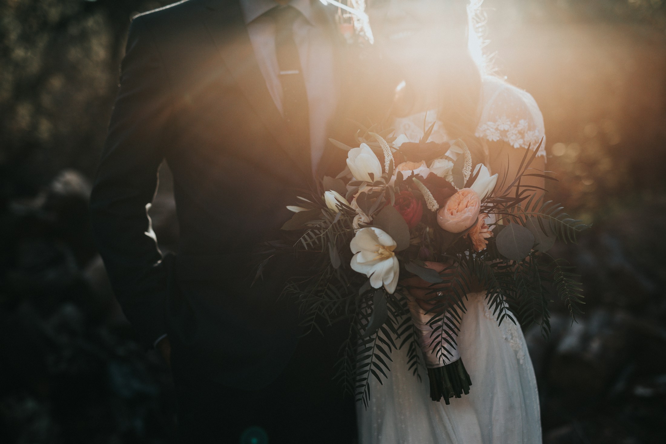 Newlyweds in a cinematic architectural setting